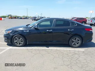 2016 Kia Optima LX Turbo with VIN 5XXGT4L12GG077169, listed as a IAAI auction lot 42108788 with 116,589 mi miles. Bid and sale history available at carsss.com. Image 14.