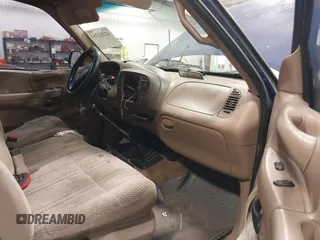 1997 Ford F-150 with VIN 1FTDF1767VKC52713, listed as a IAAI auction lot 42212161 with 136,306 mi miles and . Bid and sale history available at DreamBid. Image 5.