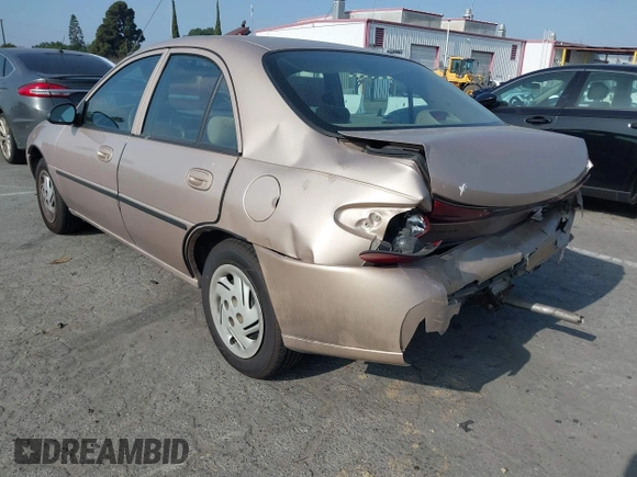 1999 Ford Escort LX with VIN 1FAFP10P3XW138847, listed as a IAAI auction lot 41216936 with 62,672 mi miles and . Bid and sale history available at DreamBid. Image 3.