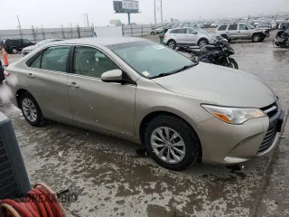 2015 Toyota Camry XLE with VIN 4T1BF1FKXFU991999, listed as a Copart auction lot 50639475 with 127,682 mi miles and Salvage Title. Bid and sale history available at DreamBid. Image 4.