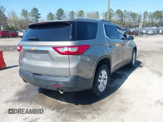 2018 Chevrolet Traverse LT Cloth z VIN 1GNEVGKW4JJ281837, wystawiony jako IAAI lot #41919081 z przebiegiem 91 496 mil mil oraz . Historia ofert i sprzedaży dostępna na DreamBid. Obrazek 4.