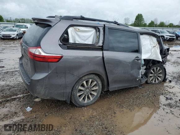2018 Toyota Sienna LE z VIN 5TDJZ3DC6JS199103, wystawiony jako Copart lot #57821175 z przebiegiem Nie podano mil oraz Szkoda całkowita • Salvage title. Historia ofert i sprzedaży dostępna na DreamBid. Obrazek 3.