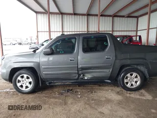 2007 Honda Ridgeline RTL z VIN 2HJYK16537H521608, wystawiony jako IAAI lot #42112626 z przebiegiem 197 076 mil mil oraz . Historia ofert i sprzedaży dostępna na DreamBid. Obrazek 6.