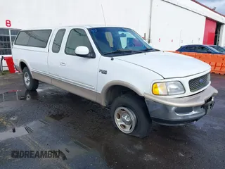 1997 Ford F-150 XL with VIN 1FTEX18L6VKC06859, listed as a IAAI auction lot 41592418 with 274,814 mi miles. Bid and sale history available at carsss.com. Image 1.