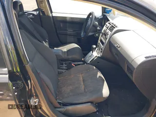 2008 Dodge Caliber SE z VIN 1B3HB28BX8D674547, wystawiony jako IAAI lot #42140339 z przebiegiem 236 666 mil mil oraz . Historia ofert i sprzedaży dostępna na DreamBid. Obrazek 5.