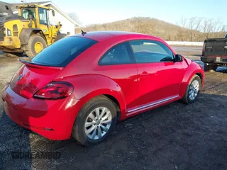 2019 Volkswagen Beetle S with VIN 3VWFD7AT1KM712384, listed as a IAAI auction lot 41505127 with 49,527 mi miles and . Bid and sale history available at DreamBid. Image 4.