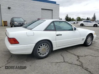 1997 Mercedes-Benz SL 500 z VIN WDBFA63F5VF143197, wystawiony jako Copart lot #45003735 z przebiegiem 100 252 mil mil oraz Szkoda całkowita • Salvage title. Historia ofert i sprzedaży dostępna na DreamBid. Obrazek 3.