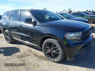 2015 Dodge Durango R/T with VIN 1C4SDHCT5FC937676, listed as a IAAI auction lot 41369508 with 107,075 mi miles and . Bid and sale history available at carsss.com. Image 1.