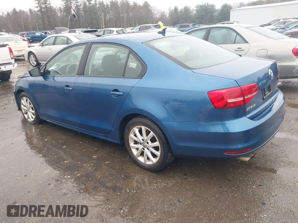 2015 Volkswagen Jetta Sedan 1.8T SE with VIN 3VWD17AJ7FM233634, listed as a IAAI auction lot 41942329 with 128,996 mi miles. Bid and sale history available at carsss.com. Image 3.