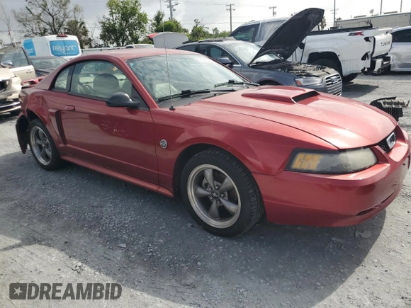 2004 Ford Mustang GT Deluxe with VIN 1FAFP42X64F174672, listed as a Copart auction lot 59902025 with 83,386 mi miles and Salvage title. Bid and sale history available at DreamBid. Image 4.