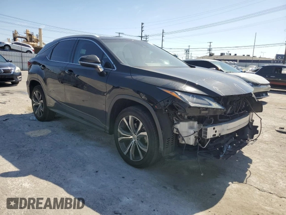 2016 Lexus RX with VIN 2T2ZFMCA6GC001537, listed as a Copart auction lot 50252175 with 132,685 mi miles and Salvage Title. Bid and sale history available at DreamBid. Image 4.