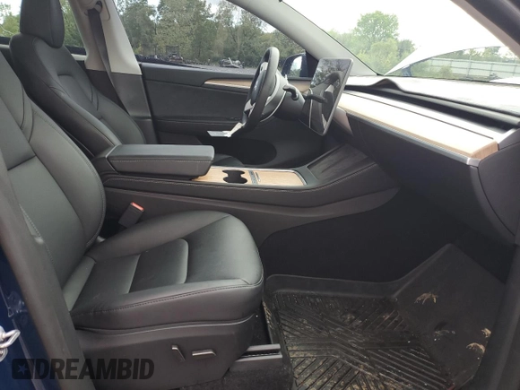 2024 Tesla Model Y Long Range z VIN 7SAYGDEE0RA286070, wystawiony jako Copart lot #58200425 z przebiegiem 16 881 mil mil oraz Szkoda całkowita • Salvage title. Historia ofert i sprzedaży dostępna na DreamBid. Obrazek 7.