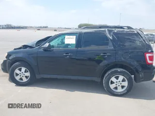 2012 Ford Escape XLT z VIN 1FMCU9DG0CKA83804, wystawiony jako IAAI lot #42099423 z przebiegiem Nie podano mil oraz . Historia ofert i sprzedaży dostępna na DreamBid. Obrazek 14.