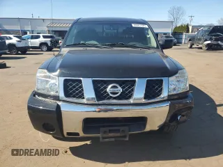 2006 Nissan Titan SE with VIN 1N6AA06A06N570395, listed as a Copart auction lot 48061925 with 131,059 mi miles and Salvage title. Bid and sale history available at DreamBid. Image 5.