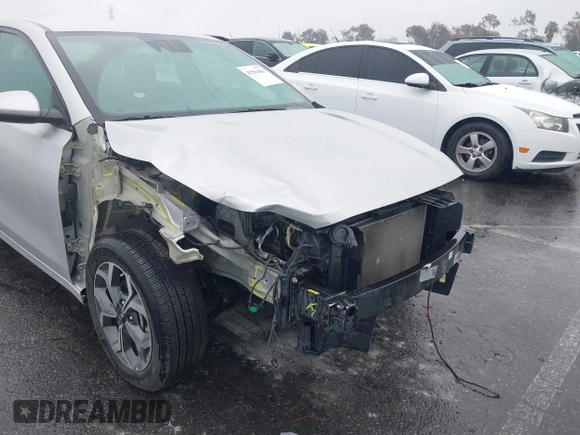 2021 Kia Forte LXS with VIN 3KPF24AD3ME268213, listed as a IAAI auction lot 41561861 with 22,544 mi miles and . Bid and sale history available at DreamBid. Image 6.