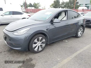 2021 Tesla Model Y Long Range with VIN 5YJYGDEEXMF092901, listed as a IAAI auction lot 42164866 with 61,240 mi miles and . Bid and sale history available at carsss.com. Image 2.