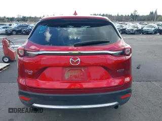 2020 Mazda CX-9 Grand Touring with VIN JM3TCBDY4L0423563, listed as a IAAI auction lot 41829394 with 76,704 mi miles and . Bid and sale history available at DreamBid. Image 17.