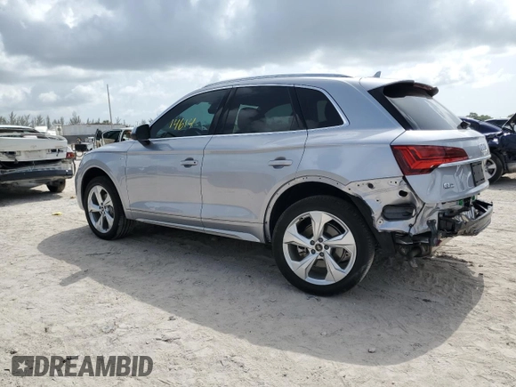 2023 Audi Q5 S line Prestige with VIN WA1FAAFY7P2061803, listed as a Copart auction lot 59907565 with 14,614 mi miles and Salvage title. Bid and sale history available at DreamBid. Image 2.