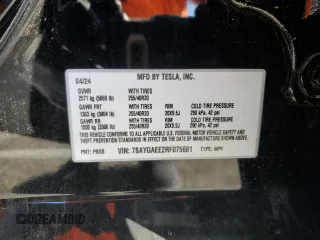 2024 Tesla Model Y Long Range z VIN 7SAYGAEE2RF075681, wystawiony jako Copart lot #86433524 z przebiegiem 18 640 mil mil oraz Szkoda całkowita • Salvage title. Historia ofert i sprzedaży dostępna na DreamBid. Obrazek 13.