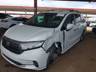 2021 Honda Odyssey Touring z VIN 5FNRL6H85MB034888, wystawiony jako IAAI lot #42386984 z przebiegiem 40 514 mil mil oraz . Historia ofert i sprzedaży dostępna na DreamBid. Obrazek 17.