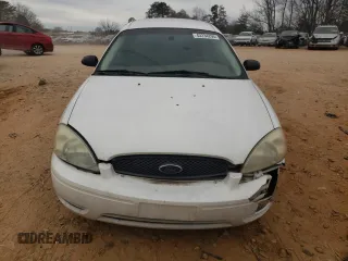 2004 Ford Taurus z VIN 1FAFP52214A194125, wystawiony jako Copart lot #43234295 z przebiegiem 216 877 mil mil oraz Szkody całkowita. Historia ofert i sprzedaży dostępna na DreamBid. Obrazek 5.