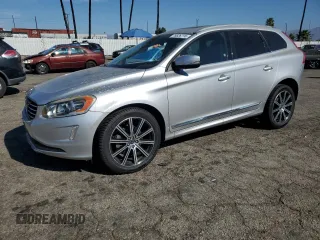 2016 Volvo XC60 T5 Drive-E Premier z VIN YV440MDK9G2911928, wystawiony jako Copart lot #76626774 z przebiegiem 104 910 mil mil oraz Szkoda całkowita • Salvage title. Historia ofert i sprzedaży dostępna na DreamBid. Obrazek 1.