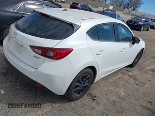 2014 Mazda 3 i Touring with VIN JM1BM1L75E1100432, listed as a IAAI auction lot 41897584 with 149,628 mi miles and . Bid and sale history available at DreamBid. Image 4.