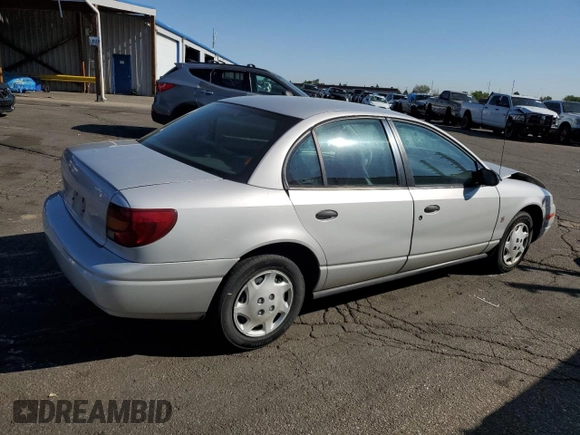 2001 Saturn SL z VIN 1G8ZH52891Z317279, wystawiony jako Copart lot #55163885 z przebiegiem 136 029 mil mil oraz Nie do naprawy • Non repairable. Historia ofert i sprzedaży dostępna na DreamBid. Obrazek 3.