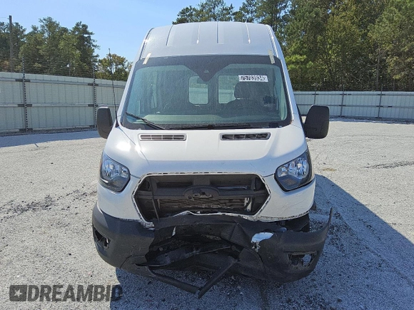 2023 Ford Transit Cargo z VIN 1FTBR3X82PKA82517, wystawiony jako Copart lot #75703934 z przebiegiem 34 304 mil mil oraz Czysty tytuł • Clean title. Historia ofert i sprzedaży dostępna na DreamBid. Obrazek 5.