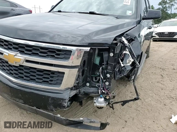 2015 Chevrolet Tahoe LS with VIN 1GNSCAKC5FR308614, listed as a Copart auction lot 60138355 with 145,797 mi miles and Salvage title. Bid and sale history available at DreamBid. Image 13.