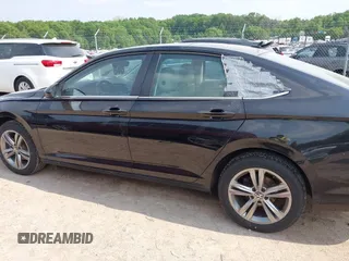 2022 Volkswagen Jetta SE with VIN 3VW7M7BU5NM011041, listed as a IAAI auction lot 42418167 with 71,415 mi miles and . Bid and sale history available at DreamBid. Image 14.
