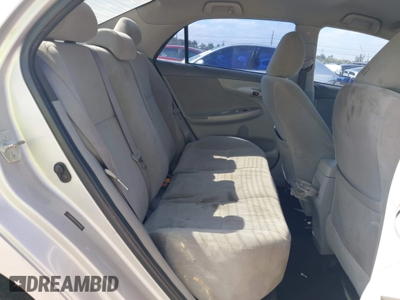 2010 Toyota Corolla with VIN 1NXBU4EE2AZ240438, listed as a IAAI auction lot 42125407 with 185,253 mi miles and . Bid and sale history available at DreamBid. Image 8.