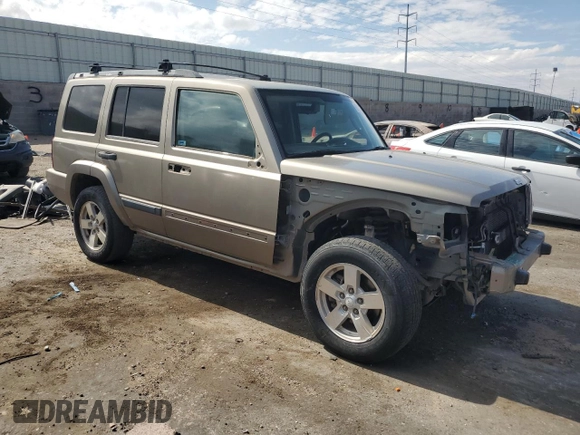2006 Jeep Commander with VIN 1J8HG48K06C319278, listed as a Copart auction lot 60560225 with 122,920 mi miles and Salvage title. Bid and sale history available at DreamBid. Image 4.
