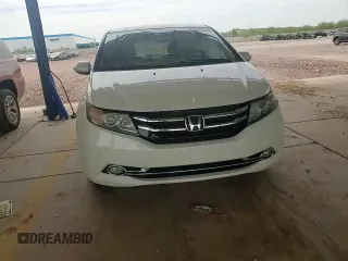 2017 Honda Odyssey Touring with VIN 5FNRL5H94HB007979, listed as a Copart auction lot 56755435 with 125,821 mi miles and Salvage title. Bid and sale history available at DreamBid. Image 14.