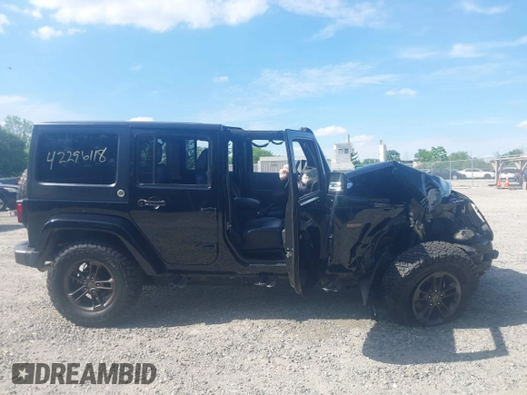 2016 Jeep Wrangler Unlimited Sahara with VIN 1C4BJWEG8GL253803, listed as a IAAI auction lot 42296118 with 163,463 mi miles and . Bid and sale history available at DreamBid. Image 13.