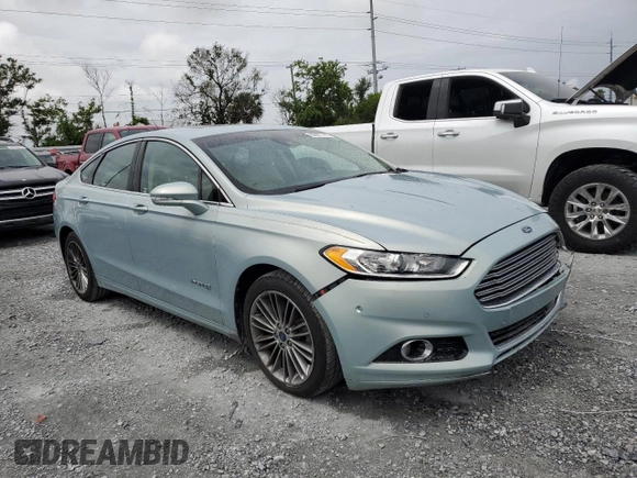 2013 Ford Fusion SE Hybrid z VIN 3FA6P0LU6DR174719, wystawiony jako Copart lot #62877715 z przebiegiem 52 884 mil mil oraz Szkoda całkowita • Salvage title. Historia ofert i sprzedaży dostępna na DreamBid. Obrazek 4.