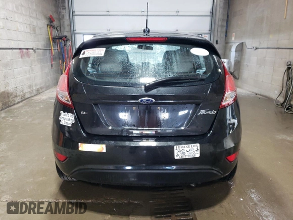 2014 Ford Fiesta SE z VIN 3FADP4EJ7EM145326, wystawiony jako Copart lot #62030855 z przebiegiem 83 625 mil mil oraz Czysty tytuł • Clean title. Historia ofert i sprzedaży dostępna na DreamBid. Obrazek 6.