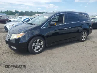 2013 Honda Odyssey Touring with VIN 5FNRL5H9XDB049308, listed as a Copart auction lot 63304125 with 159,823 mi miles and Salvage title. Bid and sale history available at DreamBid. Image 1.