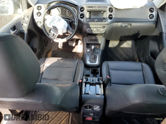 2014 Volkswagen Tiguan SEL with VIN WVGAV3AX5EW558929, listed as a Copart auction lot 71004684 with 125,628 mi miles and Clean title. Bid and sale history available at DreamBid. Image 8.