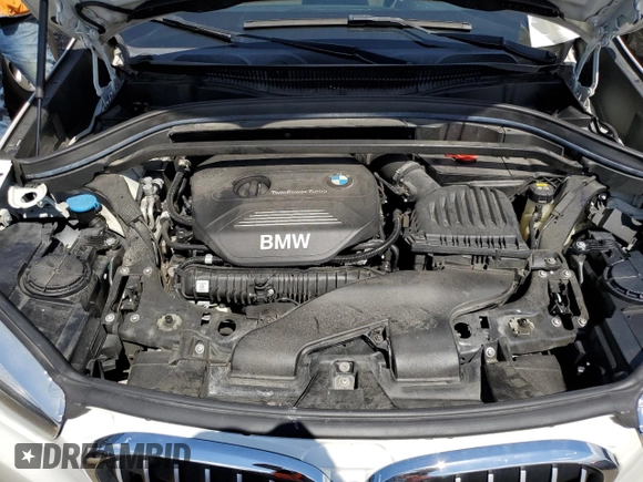 2018 BMW X1 sDrive28i with VIN WBXHU7C36J5H42760, listed as a Copart auction lot 49616663 with 89,603 mi miles and . Bid and sale history available at DreamBid. Image 12.