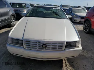 2001 Cadillac Eldorado Touring ETC z VIN 1G6ET12941B101128, wystawiony jako Copart lot #73832624 z przebiegiem Nie podano mil oraz Nie do naprawy. Historia ofert i sprzedaży dostępna na DreamBid. Obrazek 5.