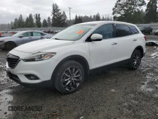 2014 Mazda CX-9 Grand Touring z VIN JM3TB2DA5E0438288, wystawiony jako Copart lot #56970705 z przebiegiem 147 526 mil mil oraz Szkoda całkowita • Salvage title. Historia ofert i sprzedaży dostępna na DreamBid. Obrazek 1.