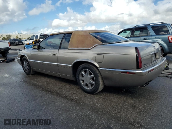 2000 Cadillac Eldorado z VIN 1G6EL12Y7YB703863, wystawiony jako Copart lot #85433244 z przebiegiem 175 416 mil mil oraz Szkoda całkowita • Salvage title. Historia ofert i sprzedaży dostępna na DreamBid. Obrazek 2.