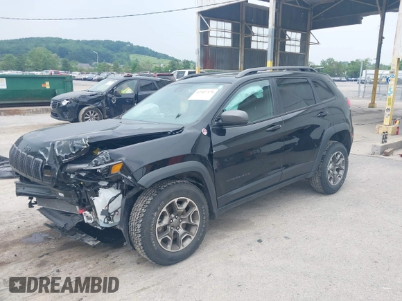 2021 Jeep Cherokee Trailhawk with VIN 1C4PJMBX0MD167941, listed as a IAAI auction lot 42507379 with 70,414 mi miles and . Bid and sale history available at DreamBid. Image 2.