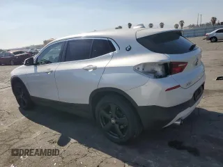 2018 BMW X2 sDrive28i with VIN WBXYJ3C34JEJ84163, listed as a Copart auction lot 54043904 with 46,509 mi miles and Salvage title. Bid and sale history available at DreamBid. Image 2.