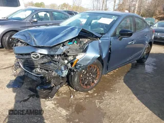 2015 Mazda 3 i SV with VIN JM1BM1T78F1271497, listed as a IAAI auction lot 40878398 with 127,617 mi miles. Bid and sale history available at carsss.com. Image 18.
