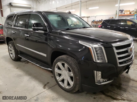 2020 Cadillac Escalade Premium Luxury with VIN 1GYS4CKJ1LR133820, listed as a Copart auction lot 82585614 with 49,787 mi miles and Salvage Title. Bid and sale history available at carsss.com. Image 4.
