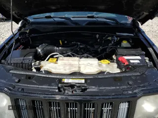2012 Jeep Liberty Sport z VIN 1C4PJMAK2CW209468, wystawiony jako Copart lot #60091085 z przebiegiem 133 975 mil mil oraz Szkoda całkowita • Salvage title. Historia ofert i sprzedaży dostępna na DreamBid. Obrazek 11.