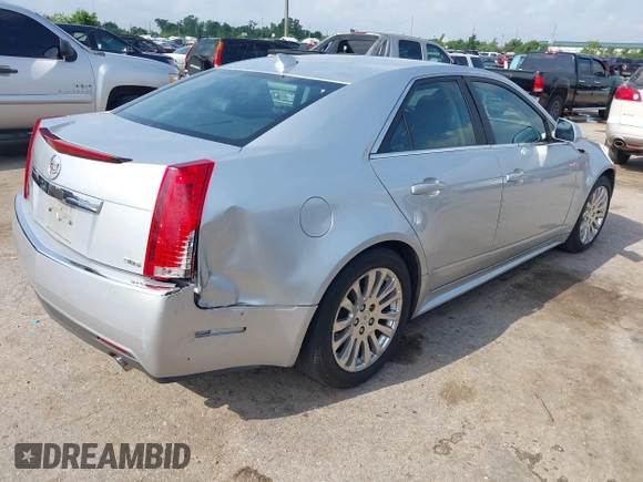 2012 Cadillac CTS Performance z VIN 1G6DJ5E37C0145221, wystawiony jako IAAI lot #42111935 z przebiegiem 82 103 mil mil oraz . Historia ofert i sprzedaży dostępna na DreamBid. Obrazek 4.