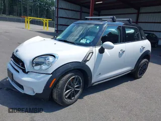 2015 MINI Countryman S z VIN WMWZC5C56FWP45194, wystawiony jako IAAI lot #40300703 z przebiegiem 95 760 mil mil oraz . Historia ofert i sprzedaży dostępna na DreamBid. Obrazek 2.